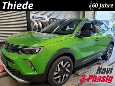 Gebraucht Opel Mokka-e Elegance 100 kW (136 PS) 2022 Matcha grün metallic SUV