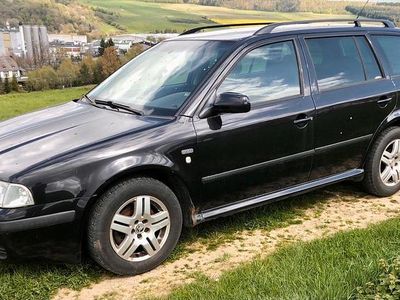 Używany Skoda Octavia 131 KM (96 kW) 2004 Czarny Kombi
