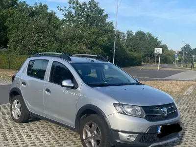 Gebraucht Dacia Sandero Stepway 90 PS (66 kW) 2014 Grau Kleinwagen