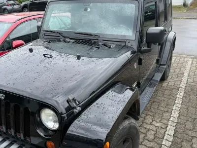 Gebraucht Jeep Wrangler Unlimited Sahara 199 PS (146 kW) 2009 Schwarz SUV