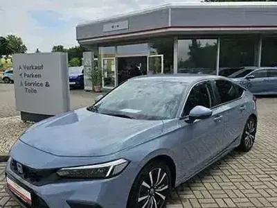 Gebraucht Honda Civic Elegance 184 PS (135 kW) 2024 Sonic grey pearl Limousine