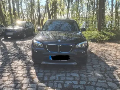 Second-hand BMW X1 150 CP (110 kW) 2012 Negru SUV
