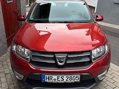 Gebraucht Dacia Sandero Prestige 90 PS (66 kW) 2016 Rot Limousine