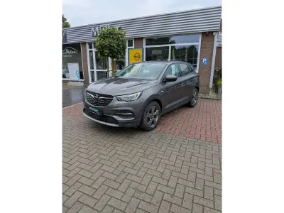 Gebraucht Opel Grandland X Elegance 224 PS (164 kW) 2022 Mondstein grau/e:vulkan grau SUV