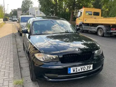 Gebraucht BMW 116 122 PS (89 kW) 2008 Schwarz Kleinwagen