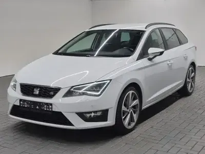 Używany Seat Leon ST FR 179 KM (131 kW) 2014 Biały Kombi
