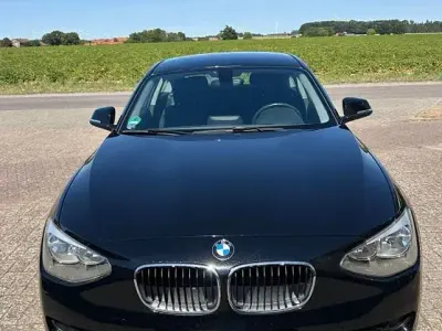 Gebraucht BMW 116 116 PS (85 kW) 2012 Schwarz Kleinwagen