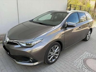 Second-hand Toyota Auris Hybrid Executive 136 CP (100 kW) 2018 Gri Break
