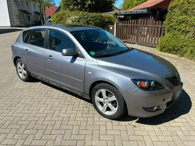 Używany Mazda 3 Comfort 105 KM (77 kW) 2004 Niebieski Sedan/Limuzyna