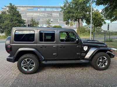 Gebraucht Jeep Wrangler Unlimited Sahara 272 PS (200 kW) 2019 Granite crystal SUV