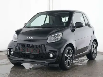 Gebraucht Smart ForTwo Coupé Passion Exclusive 60 kW (82 PS) 2024 Bodypanels in black Coupé