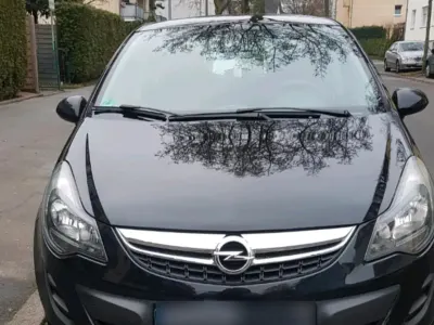Gebraucht Opel Corsa Active 69 PS (50 kW) 2013 Schwarz Kleinwagen