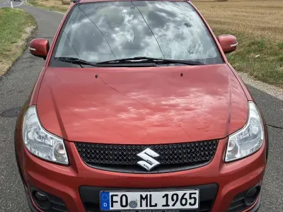 Gebraucht Suzuki SX4 Comfort 120 PS (88 kW) 2011 Rot Limousine