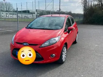 Gebraucht Ford Fiesta Trend 60 PS (44 kW) 2012 Rot Kleinwagen