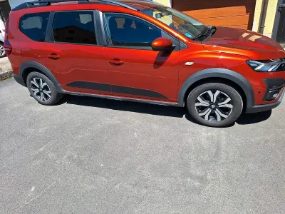 Gebraucht Dacia Jogger Comfort 110 PS (80 kW) 2023 Braun Van / Kleinbus
