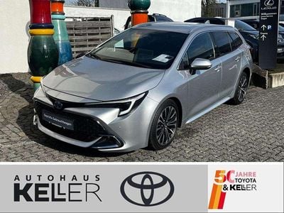 Gebraucht Toyota Corolla Hybrid 140 PS (102 kW) 2025 Shimmering silver metallic Kombi