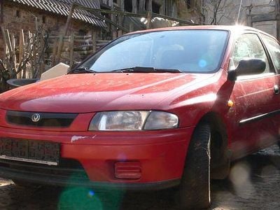 Gebraucht Mazda 323 73 PS (53 kW) 1997 Rot Kleinwagen