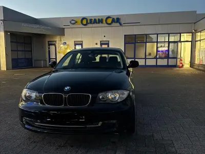 Gebraucht BMW 116 122 PS (89 kW) 2010 Schwarz Kleinwagen