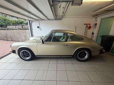 Second-hand Porsche 911 150 CP (110 kW) 1977 Auriu Coupe