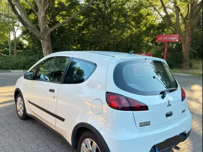 Gebraucht Mitsubishi Colt 95 PS (69 kW) 2010 Weiß Kleinwagen