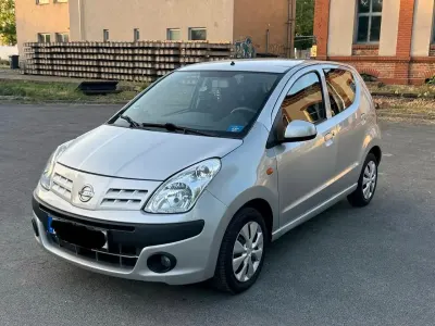 Gebraucht Nissan Pixo 75 PS (55 kW) 2012 Silber Kleinwagen