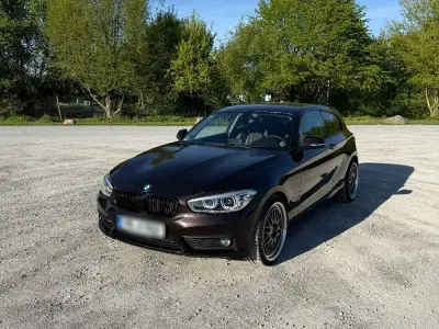 Używany BMW 118 Advantage 136 KM (100 kW) 2017 Brązowy Hatchback