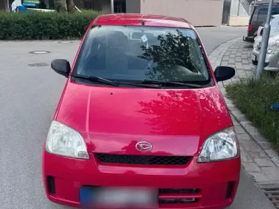 Gebraucht Daihatsu Cuore 58 PS (42 kW) 2005 Rot Kleinwagen