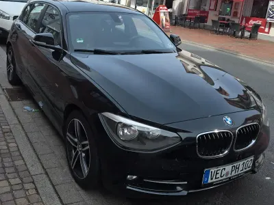 Gebraucht BMW 116 Sport Line 115 PS (84 kW) 2012 Schwarz Kleinwagen
