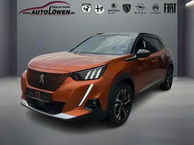 Gebraucht Peugeot e-2008 GT 100 kW (136 PS) 2022 Metfa orange fusion SUV