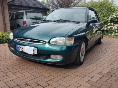 Gebraucht Ford Escort Cabriolet Ghia 116 PS (85 kW) 1997 Grün Cabrio