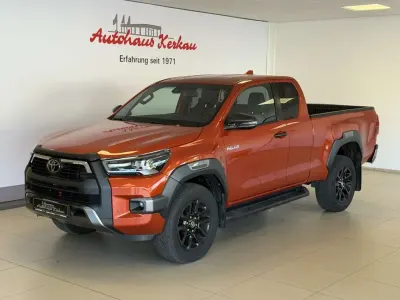 Gebraucht Toyota HiLux 204 PS (150 kW) 2023 Infernoorange metallic Pickup