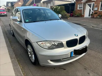 Second-hand BMW 116 122 CP (89 kW) 2010 Argintiu Hatchback