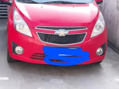 Używany Chevrolet Spark 60 KM (44 kW) 2011 Czerwony Hatchback