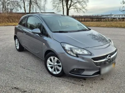 Używany Opel Corsa drive 90 KM (66 kW) 2016 Szary Hatchback