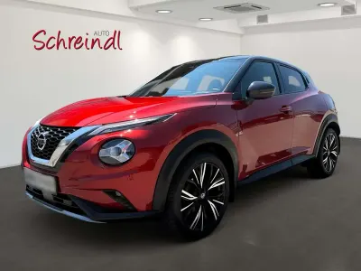 Gebraucht Nissan Juke 114 PS (83 kW) 2022 Red metallic/black SUV