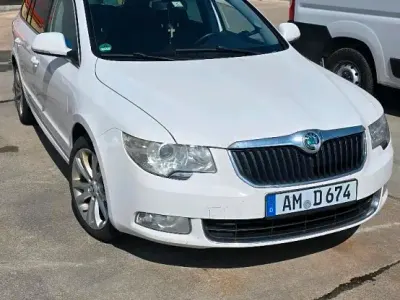 Używany Skoda Superb 170 KM (125 kW) 2010 Biały Kombi