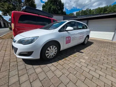 Gebraucht Opel Astra 136 PS (100 kW) 2015 Weiß Kombi