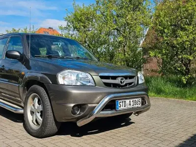 Käytetty Mazda Tribute Exclusive 197 HP (144 kW) 2002 Vihreä Katumaasturi