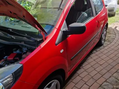 Używany Renault Twingo 75 KM (55 kW) 2014 Czerwony Hatchback