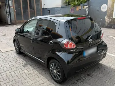 Gebraucht Toyota Aygo 68 PS (50 kW) 2009 Schwarz Kleinwagen