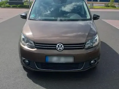Gebraucht VW Touran 140 PS (102 kW) 2012 Braun Van / Kleinbus