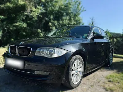 Gebraucht BMW 116 Sport Line 122 PS (89 kW) 2008 Schwarz Kleinwagen
