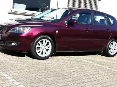 Używany Mazda 3 Active 105 KM (77 kW) 2007 Purpurowy Sedan/Limuzyna