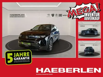 Gebraucht Opel Mokka Elegance 101 PS (74 kW) 2024 Lackierung schwarz perla nera/ SUV