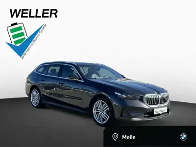 Second-hand BMW 530e Sport Line 300 CP (220 kW) 2024 Gri Break