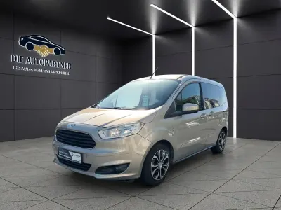 Używany Ford Tourneo Courier Trend 101 KM (74 kW) 2015 Srebrny Minivan