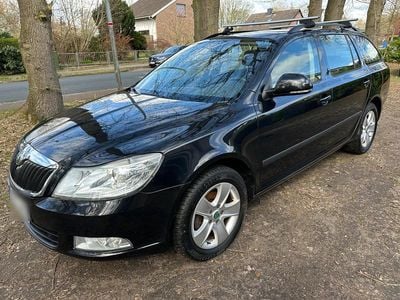 Second-hand Skoda Octavia 105 CP (77 kW) 2012 Negru Break