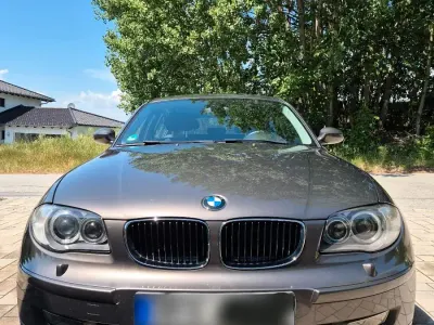 Gebraucht BMW 116 122 PS (89 kW) 2009 Grau Kleinwagen