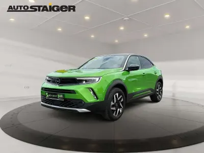 Gebraucht Opel Mokka Elegance 131 PS (96 kW) 2023 Matcha green/ikone gruen SUV
