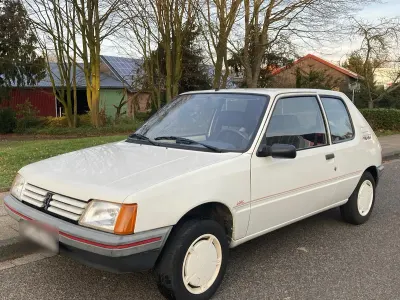 Gebraucht Peugeot 205 60 PS (44 kW) 1990 Weiß Kleinwagen